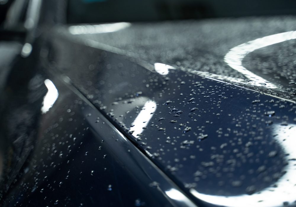 Water drop on the paintwork of the car body