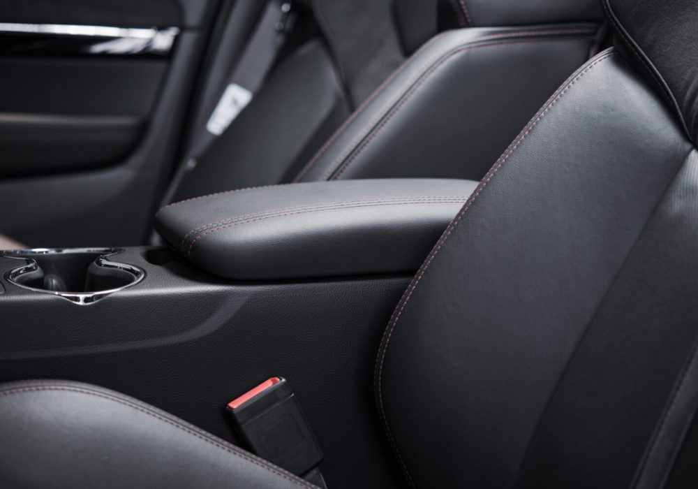 Modern Car Dark Leather Interior. Automotive Industry Designs.