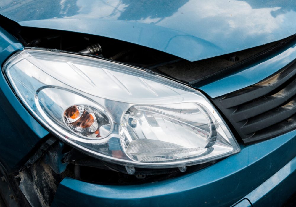 selective focus of headlight in damaged vehicle after car accident